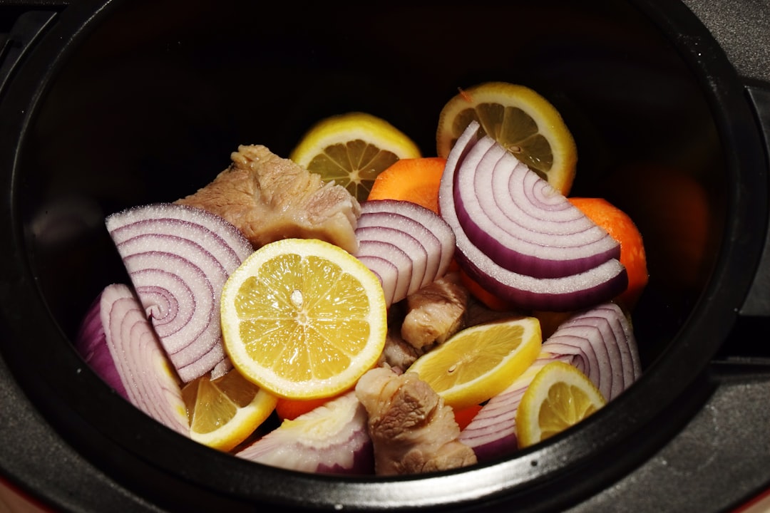 Searing beef chunks in instant pot with golden brown caramelization and aromatic vegetables
